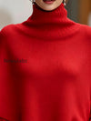 turtleneck-asymmetrical-knit-poncho-sweater